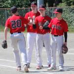 Juneau-Douglas High School: Yadaa.at Kale players warm up before the Region V title game against Ketchikan on Saturday, May 25, 2019. (Alex McCarthy | Juneau Empire)