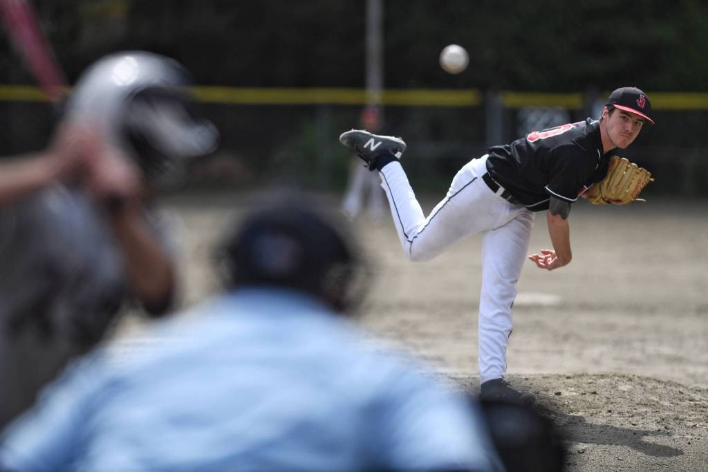 Juneau-Douglas Olin Rawson pitches against Ketchikans Brock King to start off their game during the Region V Baseball Championship at Adair-Kennedy Memorial Park on Friday, May 24, 2019. (Michael Penn | Juneau Empire)