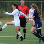 Thunder Mountains Molly Brocious moves the ball past a crowd during the ASAA/First National Bank Alaska soccer state championships at Eagle River High School on Thursday, May 23, 2019. TMHS won 1-0. (Michael Dinneen | For the Juneau Empire)