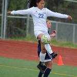 Thunder Mountains Molly Brocious elevates over a Homer defender during the ASAA/First National Bank Alaska soccer state championships at Eagle River High School on Thursday, May 23, 2019. TMHS won 1-0. (Michael Dinneen | For the Juneau Empire)