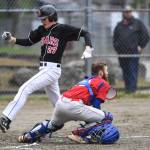 Juneau-Douglas scores in front of the throw to Sitkas catcher Morgan Simic in the fourth inning during the Region V Baseball Championship at Adair-Kennedy Memorial Park on Thursday, May 23, 2019. JDHS won 6-5. (Michael Penn | Juneau Empire)