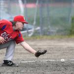 Juneau-Douglas Luis Mojica, right, slides safely into third base as Sitkas Trevin Carley misses the throw during the Region V Baseball Championship at Adair-Kennedy Memorial Park on Thursday, May 23, 2019. JDHS won 6-5. (Michael Penn | Juneau Empire)