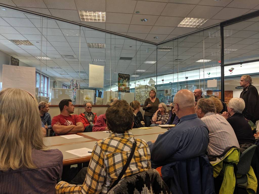 About 40 people are present for a meeting about the impact of tourism. (Ben Hohenstatt | Juneau Empire)