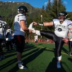 Scenes from the Juneau Alumni Football Game with football players, dance team members and cheerleaders from Juneau-Douglas and Thunder Mountain High Schools at Adair-Kennedy Memorial Field on Friday, May 24, 2019. (Michael Penn | Juneau Empire)