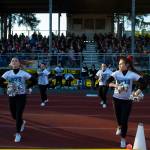 Cheerleaders perform during the Juneau Alumni Football Game with football players, dance team members and cheerleaders from Juneau-Douglas and Thunder Mountain High Schools at Adair-Kennedy Memorial Field on Friday, May 24, 2019. (Michael Penn | Juneau Empire)