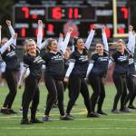 Members of the Juneau Alumni Dance Team perform during halftime of the Juneau Alumni Football Game with football players, dance team members and cheerleaders from Juneau-Douglas and Thunder Mountain High Schools at Adair-Kennedy Memorial Field on Friday, May 24, 2019. (Michael Penn | Juneau Empire)