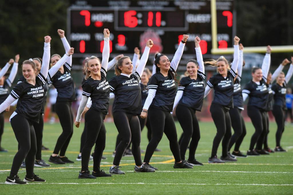Members of the Juneau Alumni Dance Team perform during halftime of the Juneau Alumni Football Game with football players, dance team members and cheerleaders from Juneau-Douglas and Thunder Mountain High Schools at Adair-Kennedy Memorial Field on Friday, May 24, 2019. (Michael Penn | Juneau Empire)