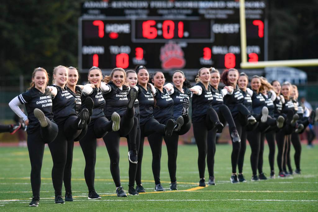 Members of the Juneau Alumni Dance Team perform during halftime of the 1st annual Juneau Alumni Football Game with football players, dance team members and cheerleaders from Juneau-Douglas and Thunder Mountain High Schools at Adair-Kennedy Memorial Field on Friday, May 24, 2019. (Michael Penn | Juneau Empire)