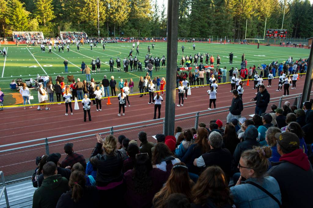 Scenes from the Juneau Alumni Football Game with football players, dance team members and cheerleaders from Juneau-Douglas and Thunder Mountain High Schools at Adair-Kennedy Memorial Field on Friday, May 24, 2019. (Michael Penn | Juneau Empire)