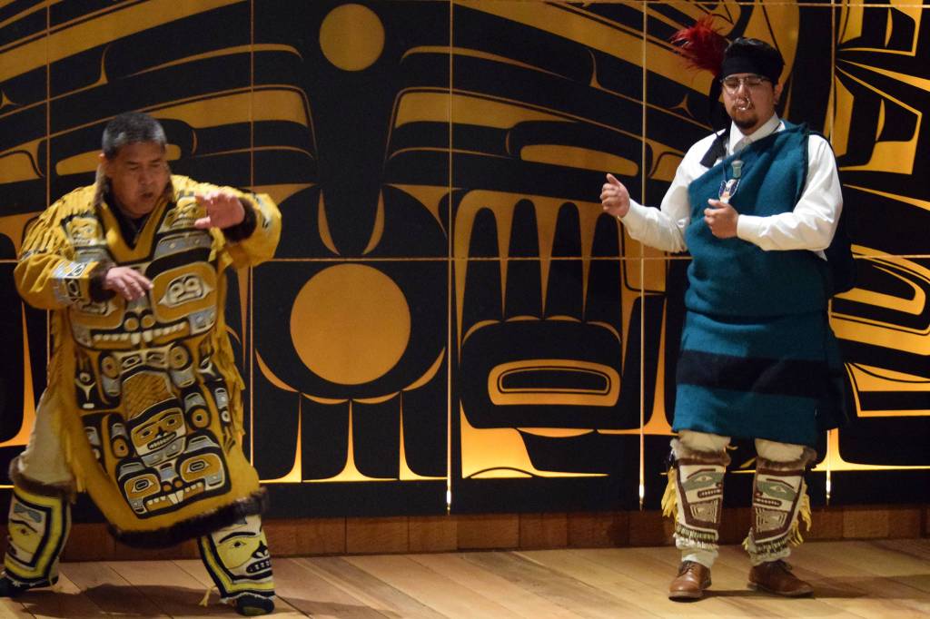 Dean George and Elijah Marks dance while wearing Chilkat Leggings, Friday, May 31, 2019. One pair of leggings was made by weavers Anastasia Shaawaat Ku Gei Hobson-George and Lily Hope and the other pair was made by Hopes late mother, Clarissa Rizal, and Rizals mentor Jennie Thlunaut. (Ben Hohenstatt | Juneau Empire)