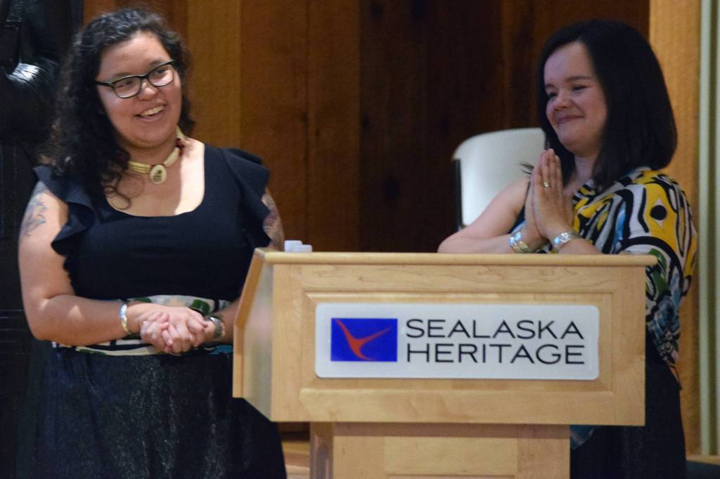 Tlingit weavers Anastasia Shaawaat Ku Gei Hobson-George and Lily Hope talk about a pair of Chilkat dance leggings they made during the Our Grandmothers Wealth presentation Friday, May 31, 2019. The event was an introduction of a new piece of art and a close to Hobson-Georges apprenticeship. (Ben Hohenstatt | Juneau Empire)