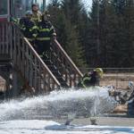 Airport Rescue Firefighter Jason Tarver takes a foam sample as southeast firefighters update their airport rescue firefighting skills at the Hagevig Regional Fire Training Center on Thursday, April 13, 2017. (Michael Penn | Juneau Empire File)                                Airport Rescue Firefighter Jason Tarver takes a foam sample as southeast firefighters update their airport rescue firefighting skills at the Hagevig Regional Fire Training Center on Thursday, April 13, 2017. (Michael Penn | Juneau Empire File)