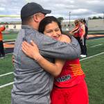 North/Southeast All-Stars coach Louis Tagaban hugs his daughter Bailey Wery Tagaban at the Brian Young Invitational at West Anchorage High School on Saturday, June 1, 2019. (Courtesy Photo | Louis Tagaban)