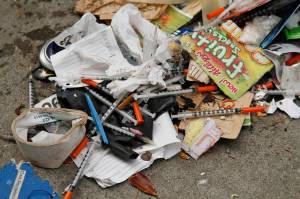 In this Feb. 26, 2016, file photo, a number of syringes are scattered in the remains of a tent city being cleared by city workers along Division Street in San Francisco. San Francisco supervisors consider legislation Tuesday, June 4, 2019, allowing the city to force mentally ill drug addicts into housing and treatment for up to a year. Mayor London Breed says its inhumane to let addicts languish on the streets, but homeless advocates say the measure is extreme and a violation of civil rights. (AP Photo | Eric Risberg, File)