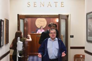 Sen. Lyman Hoffman, D-Bethel, leaves the Senate chambers after a call on the Senate was lifted on Thursday, June 6, 2019. Sen. Hoffman said, Another fun day in the Senate on his way out. (Michael Penn | Juneau Empire)