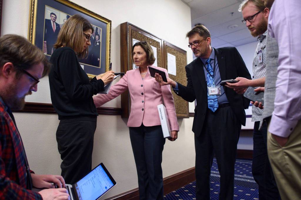 Senate President Cathy Giessel, R-Anchorage, center, is interviewed by members of the media after a call on the Senate was lifted on Thursday, June 6, 2019 (Michael Penn | Juneau Empire)
