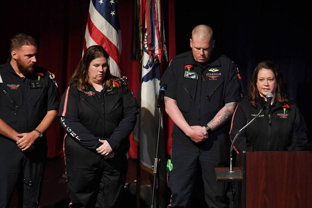 Guardian Flight nurse Leslie Carey reflects on flight nurse Margaret Langston during a memorial for the Guardian Flight crew at Juneau-Douglas High School: Yadaa.at Kalé on Friday, June 7, 2019. (Michael Penn | Juneau Empire)