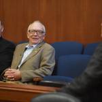 House members Rep. Gary Knopp, R-Kenai, left, and Rep. Steve Thompson, R-Fairbanks, speak with Sen. John Coghill, R-North Pole, as they watch the senate from the senate gallery on Monday, June 10, 2019. (Michael Penn | Juneau Empire)