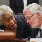 Sen. Elvi Gray-Jackson, D-Anchorage, speaks with Sen. Gary Stevens, R-Kodiak, at the Capitol on Monday, June 10, 2019. (Michael Penn | Juneau Empire)