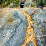 Acid contaminated water runs from the entrance of the Tulsequah Chief Mine in Canada in October 2018. Eight U.S. senators sent a letter Thursday to British Columbia, Canadas premier asking for more transboundary water oversight. (Michael Penn | Juneau Empire)