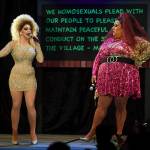 Gigi Monroe, left, shares the stage with Kelexis Davenport, of Dallas, Texas, the fifth annual GLITZ Drag Show in honor of the 50th Anniversary of the Stonewall Riots and Juneau Pride Kickoff! at Centennial Hall on Friday, June 14, 2019. (Michael Penn | Juneau Empire)