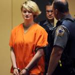 Denali Brehmer, 18, appears in a Superior courtroom for her arraignment in the Nesbett Courthouse on Tuesday in Anchorage. Brehmer, 18, now faces four federal child pornography charges in addition to state murder charges in the slaying of Cynthia Hoffman. Hoffman was taken to the Thunderbird Falls trailhead in Chugiak where she was bound with duct tape, shot and left in the Eklutna River on June 2, according to charges. (Bill Roth/Anchorage Daily News via AP)