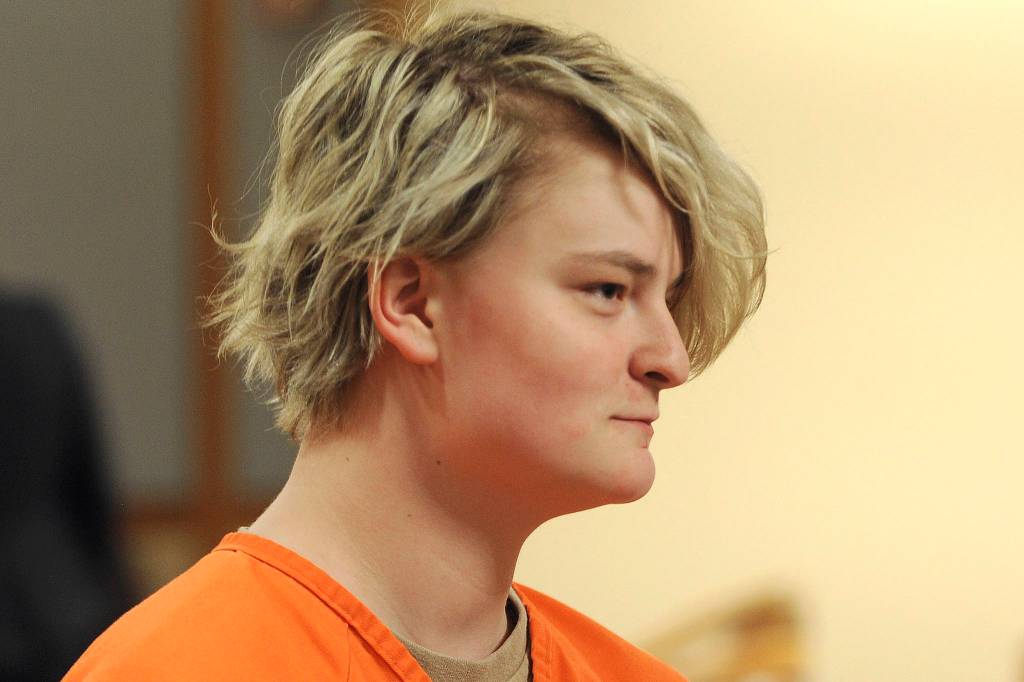 Denali Brehmer, 18, appears in a Superior courtroom for her arraignment in the Nesbett Courthouse on Tuesday in Anchorage. Brehmer, 18, now faces four federal child pornography charges in addition to state murder charges in the slaying of Cynthia Hoffman. Hoffman was taken to the Thunderbird Falls trailhead in Chugiak where she was bound with duct tape, shot and left in the Eklutna River on June 2, according to charges. (Bill Roth/Anchorage Daily News via AP)