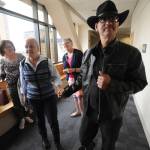 Timothy Hoffman, right, father of slain teenager Cynthia Hoffman receives support from Edie Grunwald, left, whos son David Grunwald was murdered in Nov. 2016, as they entered a Superior courtroom for the arraignment of Cynthias murder suspects in the Nesbett Courthouse on Tuesday, June 18, 2019 in Anchorage. (Bill Roth/Anchorage Daily News via AP)