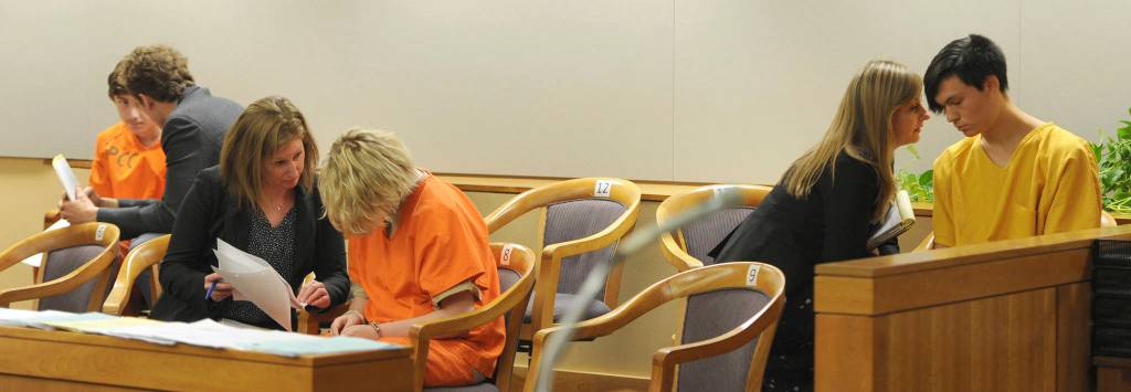 From left, Kayden McIntosh, 16, Denali Brehmer, 18, and Caleb Leyland, 19, are arraigned by a Superior court judge in the Nesbett Courthouse in Anchorage on Tuesday after a grand jury indicted them on first-degree murder and other charges in the shooting death of 19-year-old Cynthia Hoffman. Hoffman was taken to the Thunderbird Falls trailhead in Chugiak where she was bound with duct tape, shot and left in the Eklutna River on June 2, according to charges. (Bill Roth/Anchorage Daily News via AP)
