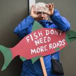 Mary Watson photographs during a Tongass Rally in front of the Alaska State Capitol to show local support for the 2001 National Roadless Rule on Saturday, June 22, 2019. (Michael Penn | Juneau Empire)