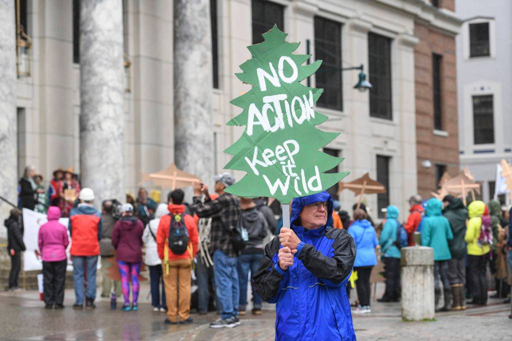 Don Kussart holds a sign during a Tongass Rally in front of the Alaska State Capitol to show local support for the 2001 National Roadless Rule on Saturday, June 22, 2019. (Michael Penn | Juneau Empire)
