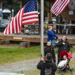 Bob Shernikoff raises the flag during the opening ceremony of the 29th Annual Gold Rush Days at Savikko Park on Saturday, June 22, 2019. (Michael Penn | Juneau Empire)