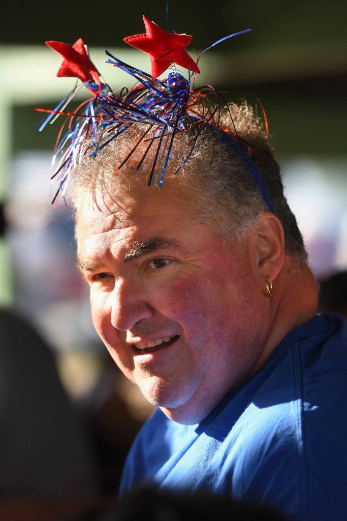 John Delgado participates in a watermelon eating contest during a community picnic sponsored by the Douglas Fourth of July Committee and Capital City Fire/Rescue at Sandy Beach on Wednesday, July 3, 2019. (Michael Penn | Juneau Empire)