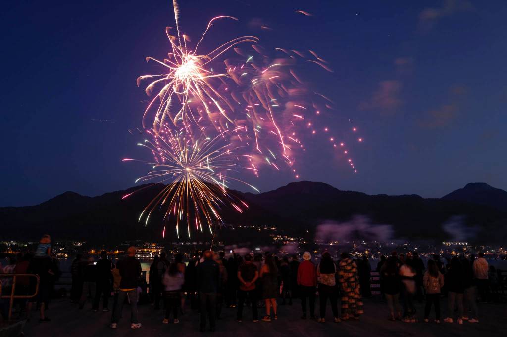 Juneau residents gather around the downtown waterfront to watch the annual fireworks display on Wednesday, July 3, 2019. (Michael Penn | Juneau Empire)