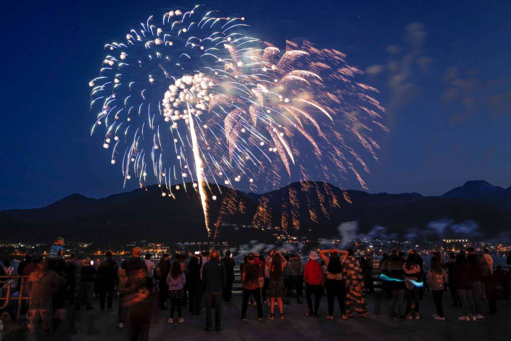 Juneau residents gather around the downtown waterfront to watch the annual fireworks display on Wednesday, July 3, 2019. (Michael Penn | Juneau Empire)