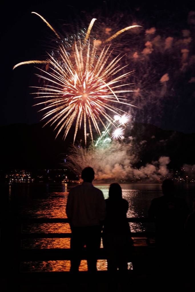 Juneau residents gather around the downtown waterfront to watch the annual fireworks display on Wednesday, July 3, 2019. (Michael Penn | Juneau Empire)