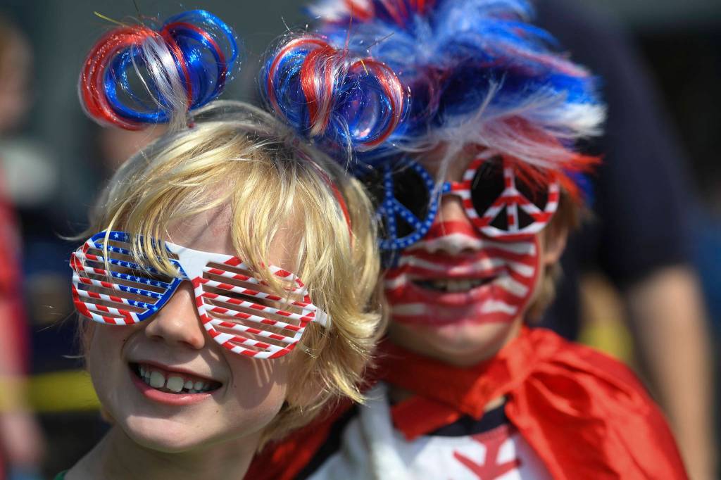 Gabe McGuan, 7, and his brother, Garrett, 10, show their patriotic colors during the Douglas Fourth of July Parade on Thursday, July 4, 2019. (Michael Penn | Juneau Empire)