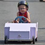 Amelia Farrell, 5, races down St. Anns Avenue at the Final Soapbox Challenge during the Douglas Fourth of July festivities on Thursday, July 4, 2019. (Nolin Ainsworth | Juneau Empire)