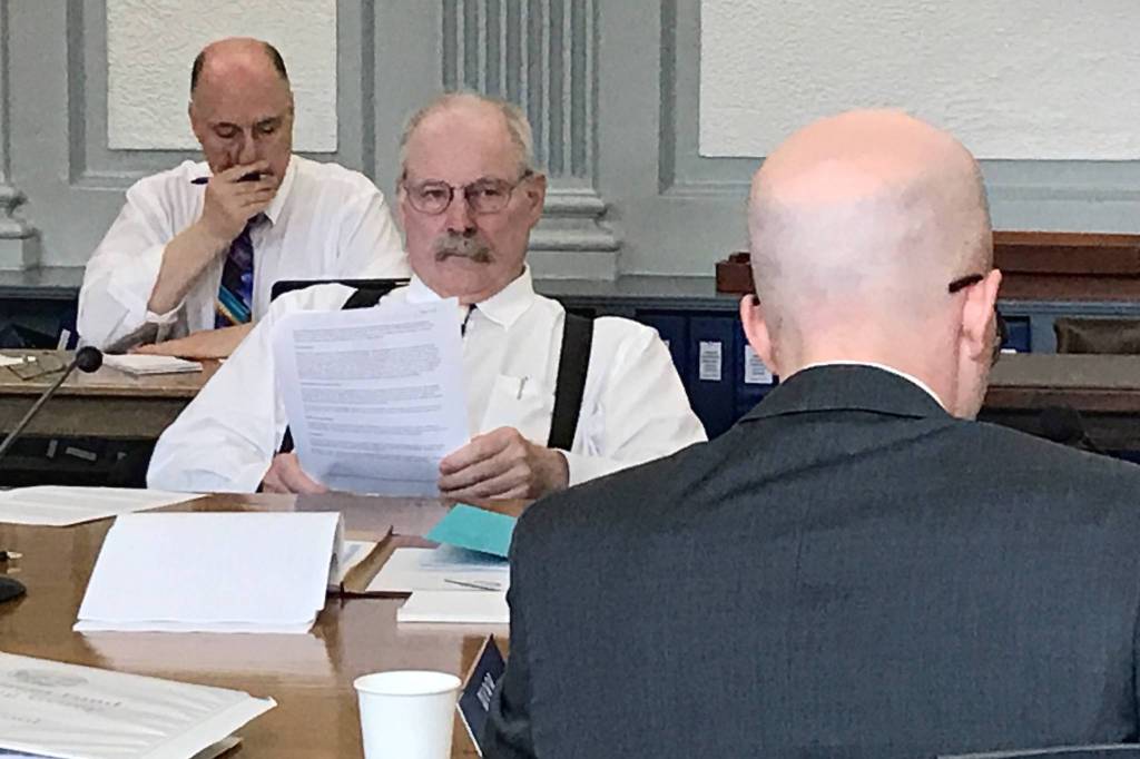 Sen. Bert Stedman, R-Sitka, listens to Rep. Jonathan Kreiss-Tomkins, D-Sitka, make a presentation during a Permanent Fund Working Group at the Capitol on Monday, July 8, 2019. (Michael Penn | Juneau Empire)