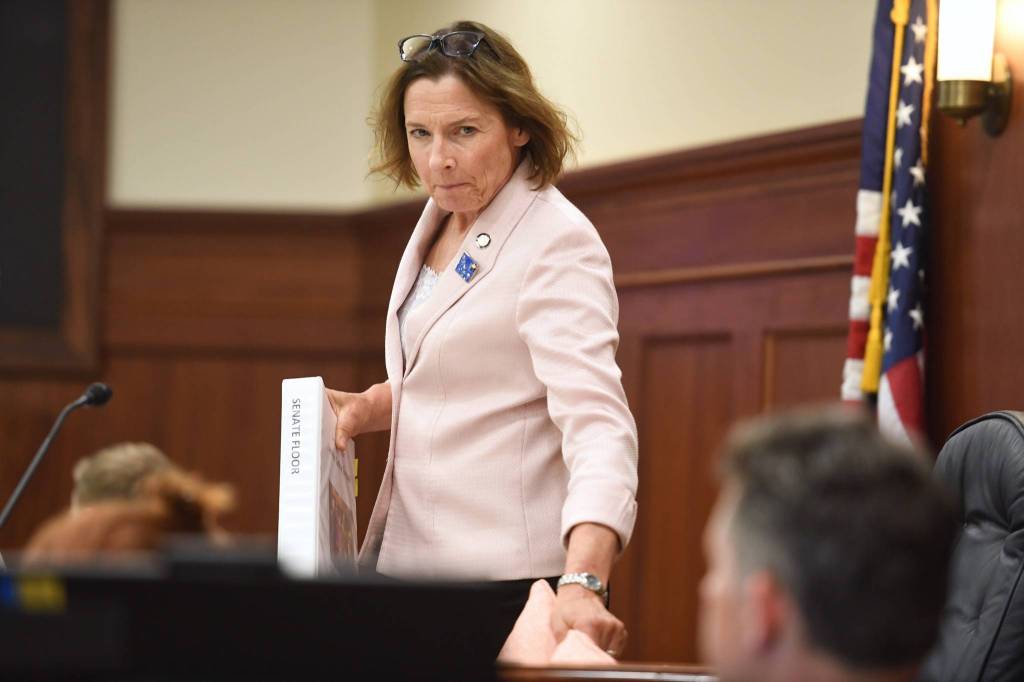 Senate President Cathy Giessel, R-Anchorage, takes her seat before gaveling in a second special session on Monday, July 8, 2019. (Michael Penn | Juneau Empire)