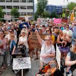 Hundreds of people gather for a rally in front of the Capitol calling for for an override of Gov. Mike Dunleavys budget vetoes on Monday, July 8, 2019. (Michael Penn | Juneau Empire)