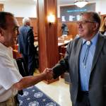 Sen. Lyman Hoffman, D-Bethel, right, is congratulated by Sen. Donny Olson, D-Golovin, after being named the new Senate Majority Leader, replacing Sen. Mia Costello, R-Anchorage, on the first day of the Second Special Session of the Alaska Legislature in Juneau on Monday, July 8, 2019. Sen. Costello joined a minority of legislators that met in Wasilla in support of Gov. Mike Dunleavy. (Michael Penn | Juneau Empire)