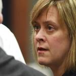 In this file photo from June 10, 2019, Sen. Mia Costello talks with other legislators on the Senate floor. (Michael Penn | Juneau Empire File)