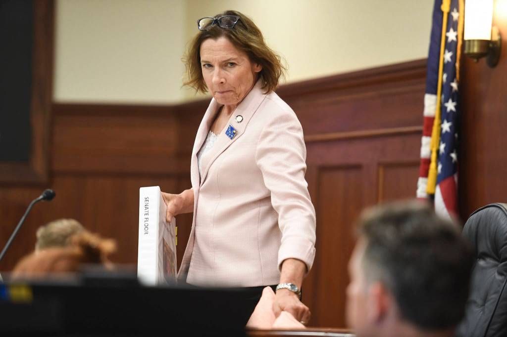 Senate President Cathy Giessel, R-Anchorage, takes her seat in the Senate chambers on the first day of the Second Special Session of the Alaska Legislature in Juneau on Monday, July 8, 2019. (Michael Penn | Juneau Empire)