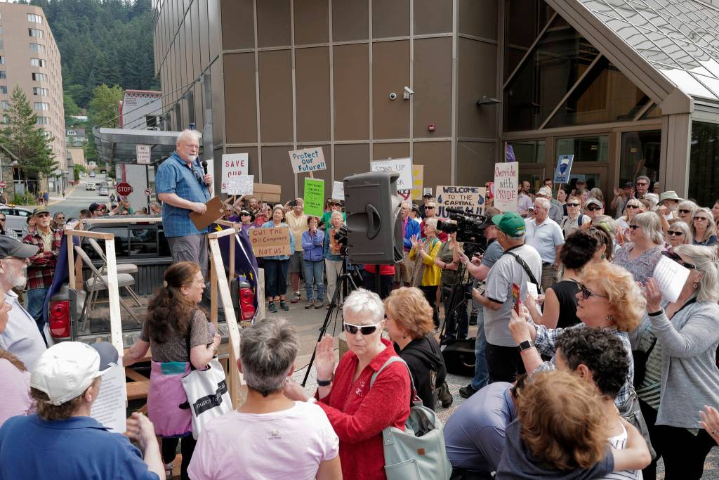 Hundreds attend a rally in front of the Capitol calling for an override of Gov. Mike Dunleavys budget vetoes on the first day of the Second Special Session of the Alaska Legislature in Juneau on Monday, July 8, 2019. (Michael Penn | Juneau Empire)