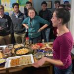 Maleah Wenzel explains traditional Alaska foods to guests at the Aurora Club at Darmouth College on May 1, 2019. (Courtesy photo | Dartmouth Aurora Club)