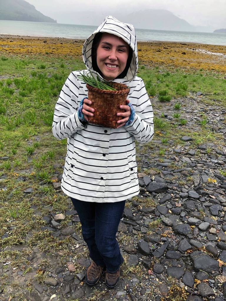 Maleah Wenzel harvests goose tongue while on summer break in Wrangell, June 11, 2019. (Courtesy photo | Vivian Faith Prescott)