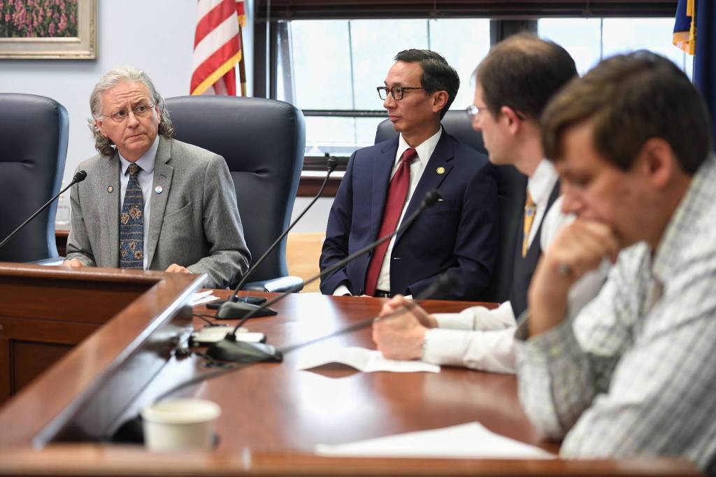 Senate Minority Leader Sen. Tom Begich, D-Anchorage, left, speaks to the media as Sen. Scott Kawasaki, D-Fairbanks, Sen. Jesse Kiehl, D-Juneau, and Sen. Bill Wielechowski, D-Anchorage, listen after a failed override vote on Gov. Mike Dunleavys budget vetoes during a Joint Session of the Alaska Legislature at the Capitol on Wednesday, July 10, 2019. (Michael Penn | Juneau Empire)