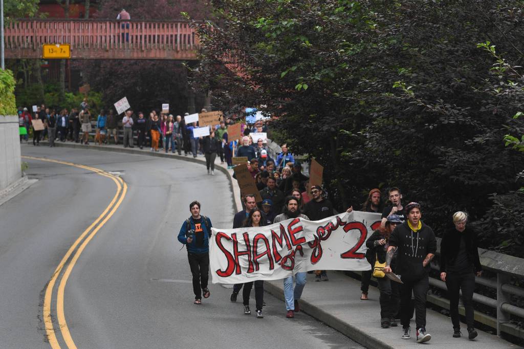 Over hundred people gather in front of the Governors Mansion to protest budget vetoes by Gov. Mike Dunleavy on Friday, July 12, 2019. (Michael Penn | Juneau Empire)