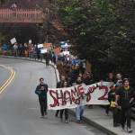 Over hundred people march from the Capitol to the Governors Mansion during a rally to protest budget vetoes by Gov. Mike Dunleavy on Friday, July 12, 2019. (Michael Penn | Juneau Empire)